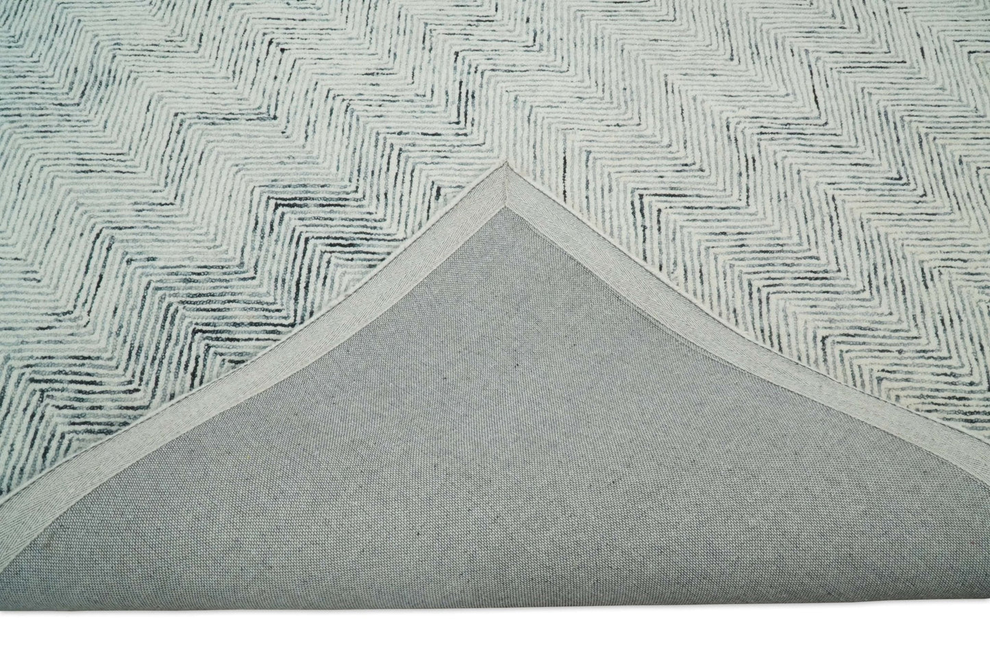 5x8 and 8x10 Hand Made Woolen Modern Blue and Ivory Area Rug | EVE001 - Nuvé