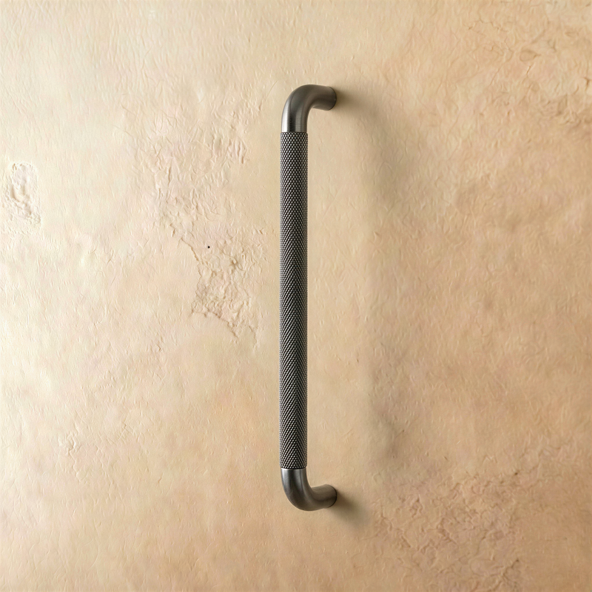 Gray Alyma knob and pull bar from Residence Supply, modern cabinet hardware for furniture or cabinets.