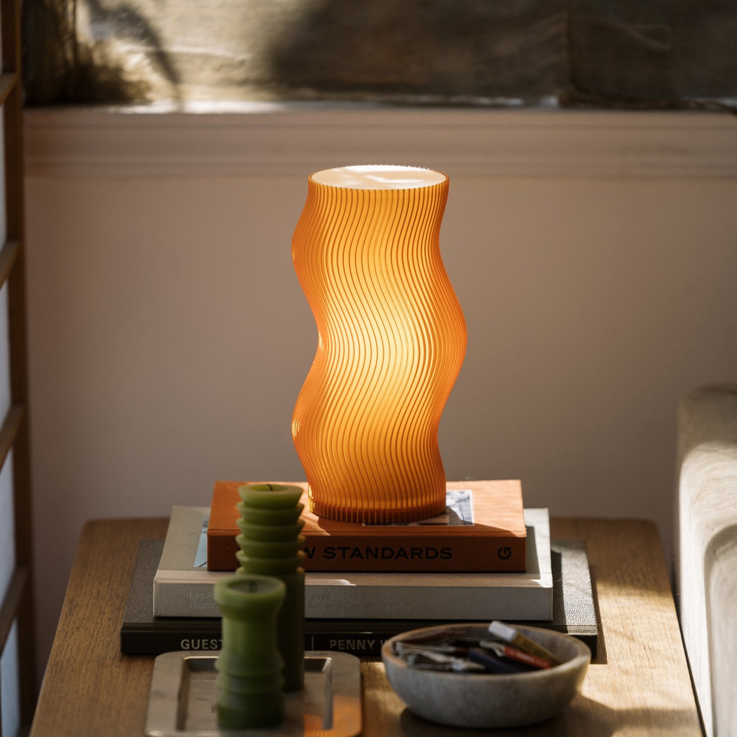 Terra Labs Woogie Table Lamp with a modern, playful design and soft glow, perfect for bedside or desk lighting.