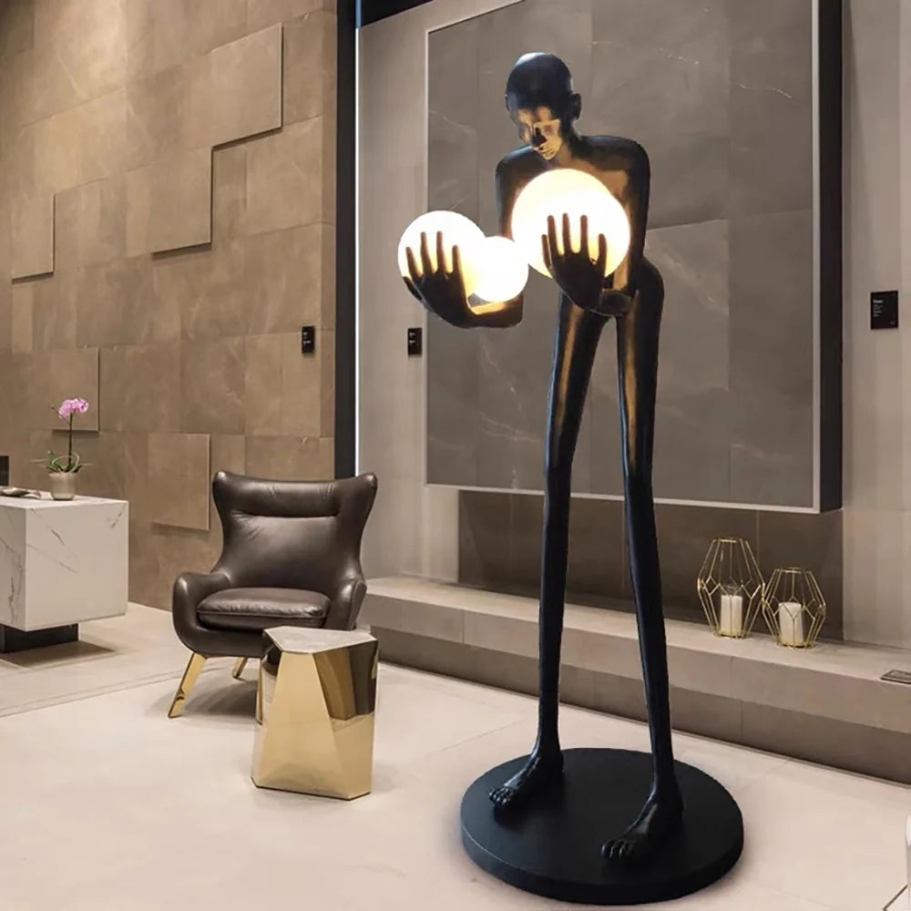 Figure Holding Ball Sculpture Floor Lamp - Nuvé