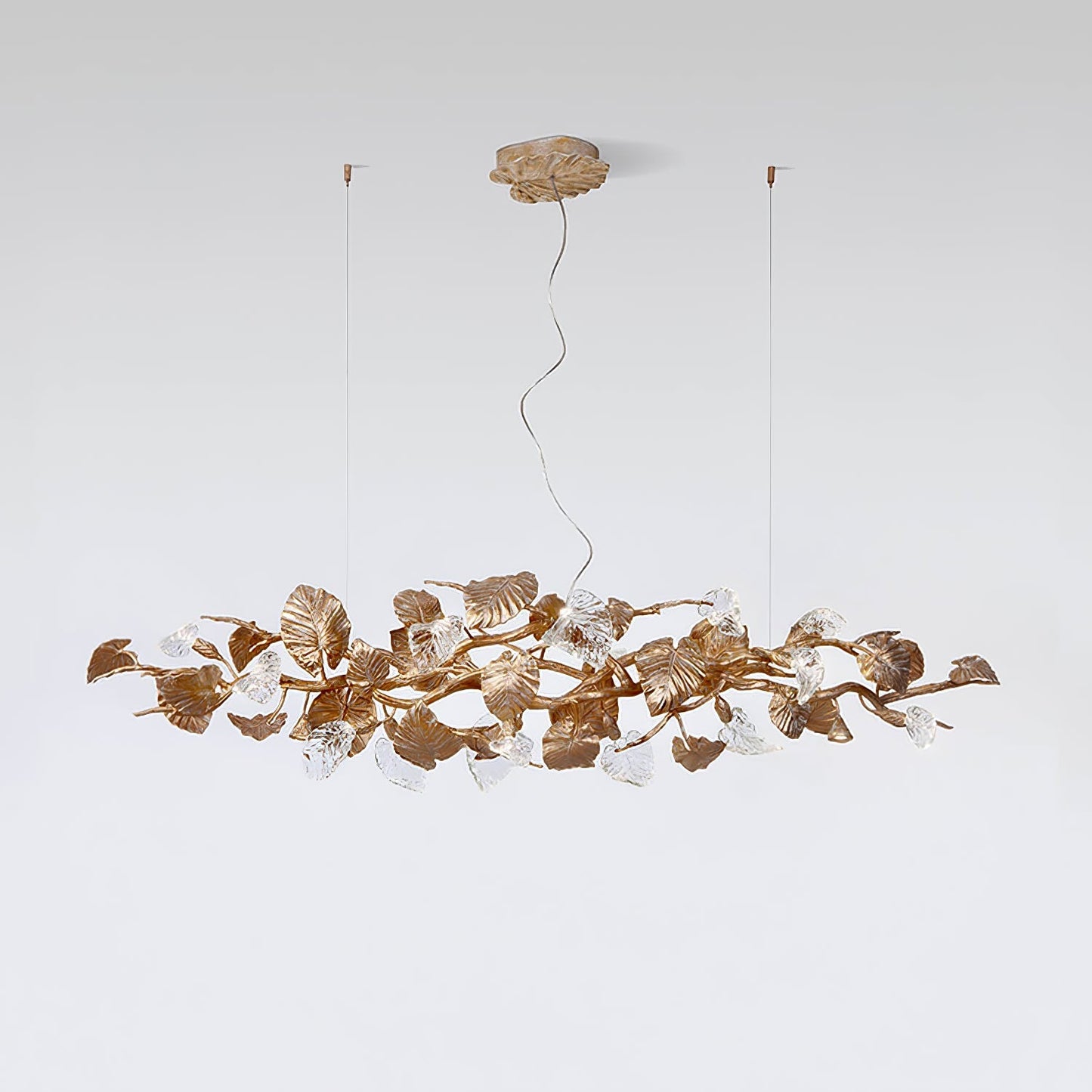Elegant gold leaf chandelier by korewolamp featuring intricate leaf design and warm lighting for luxurious interior decor.
