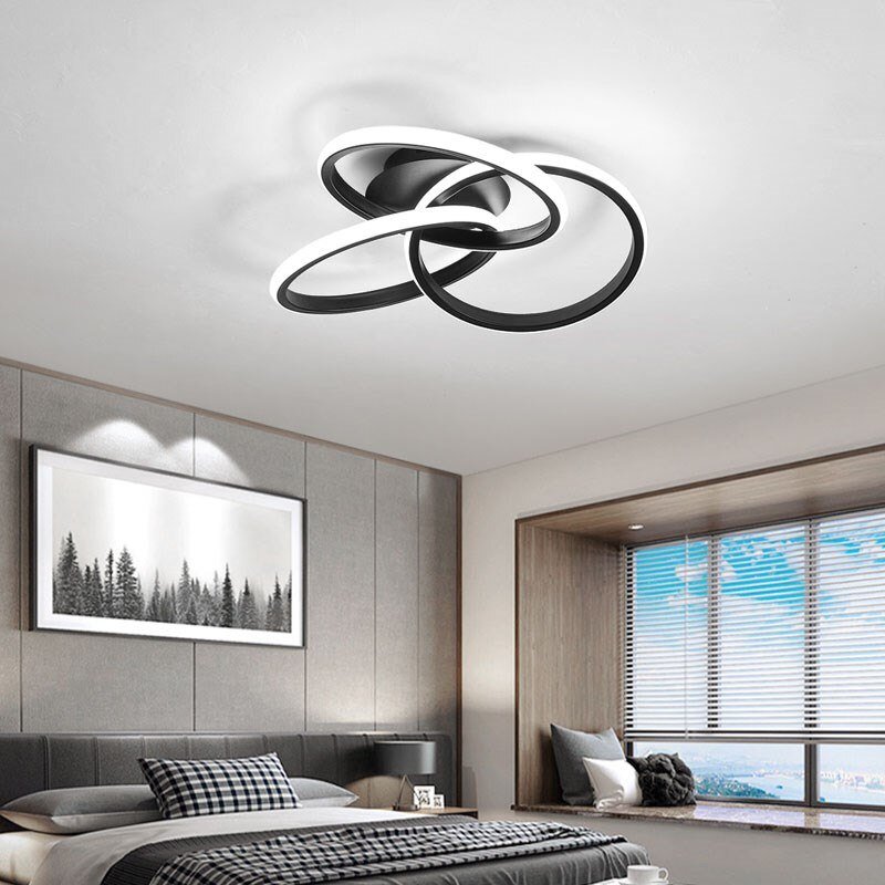 Alyona ceiling light by Residence Supply featuring a modern design with glass and metal elements, mounted on a ceiling.