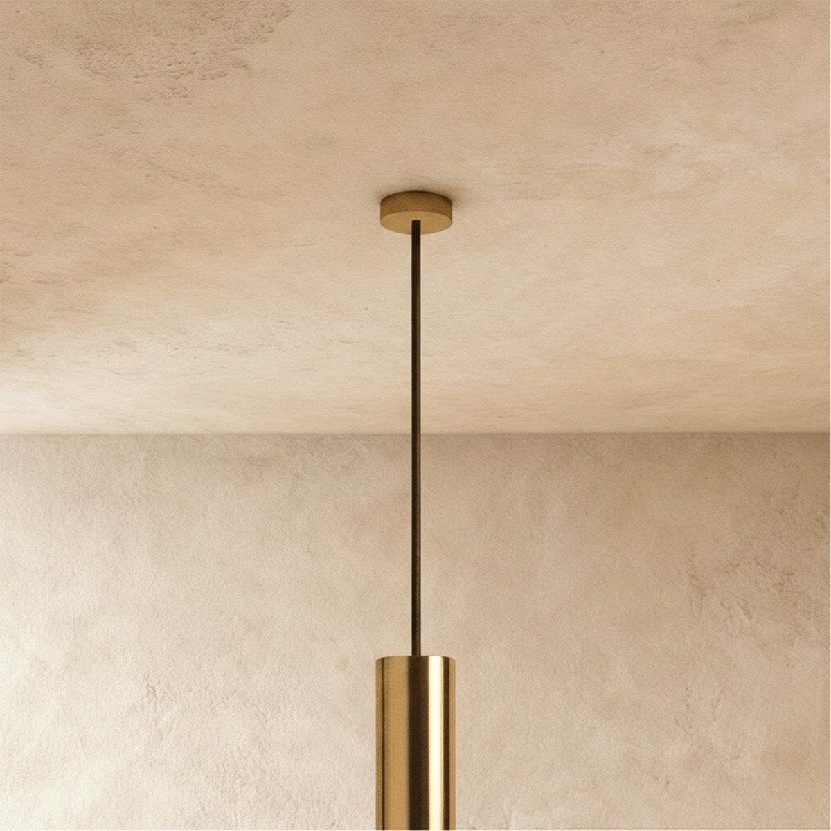 Modern Cielo Pendant Light by Residence Supply with sleek metal finish and glass shade hanging from a ceiling mount.