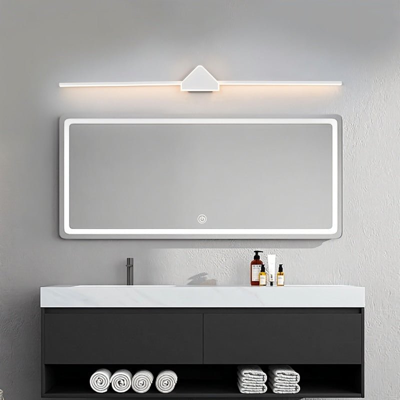 Modern Clytheris Wall Lamp by Residence Supply, white bathroom vanity light fixture with sleek design and illuminated glow.