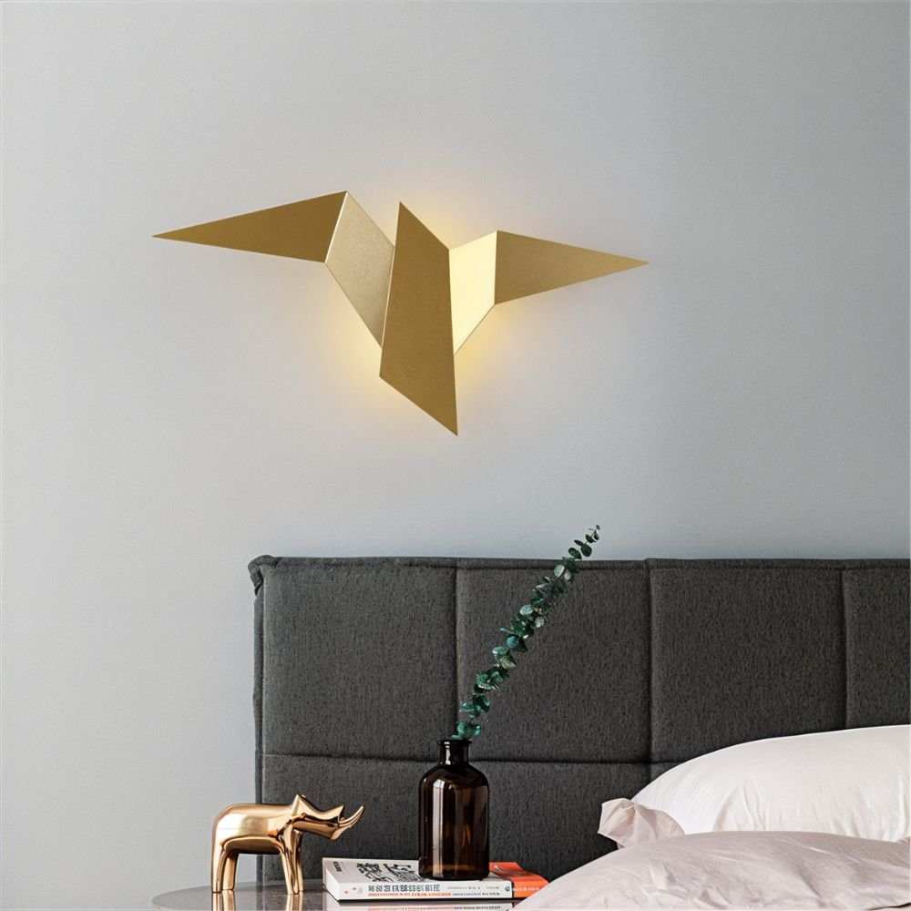 Residence Supply Finch Wall Lamp mounted on a wall with a sleek metal finish and modern design for stylish interior lighting.