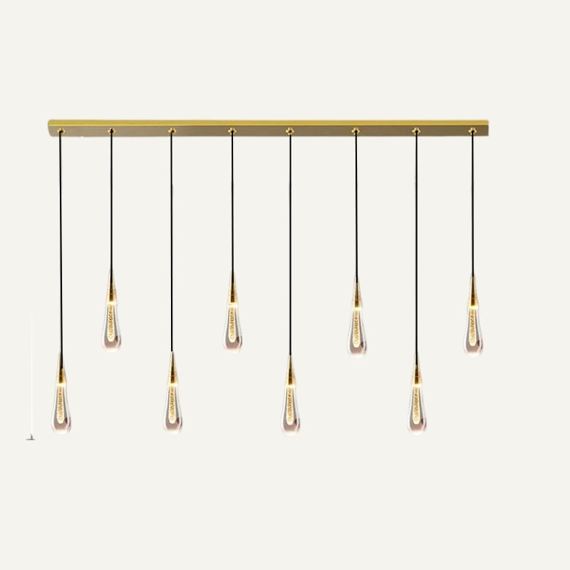 Drop Linear Chandelier by Residence Supply featuring sleek metal arms and multiple hanging lights in a modern design.