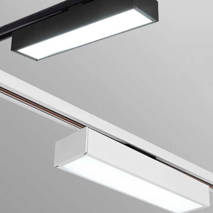 Residence Supply Quinn Track Light System with adjustable spotlights mounted on a sleek black track for modern accent lighting.