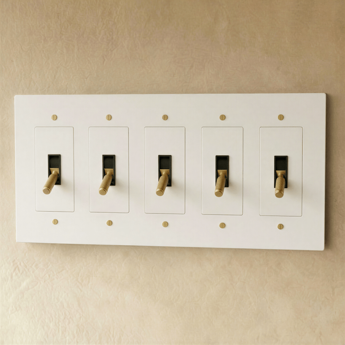 Brass toggle switch for 1 to 5 gang electrical control, Residence Supply brand, showing multiple switch options on a white background.