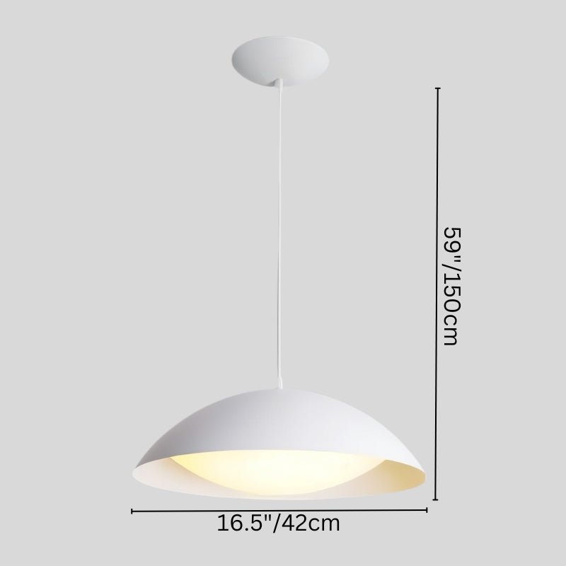 Toviel Pendant Light by Residence Supply hanging from ceiling with a modern design and warm lighting in a contemporary interior.