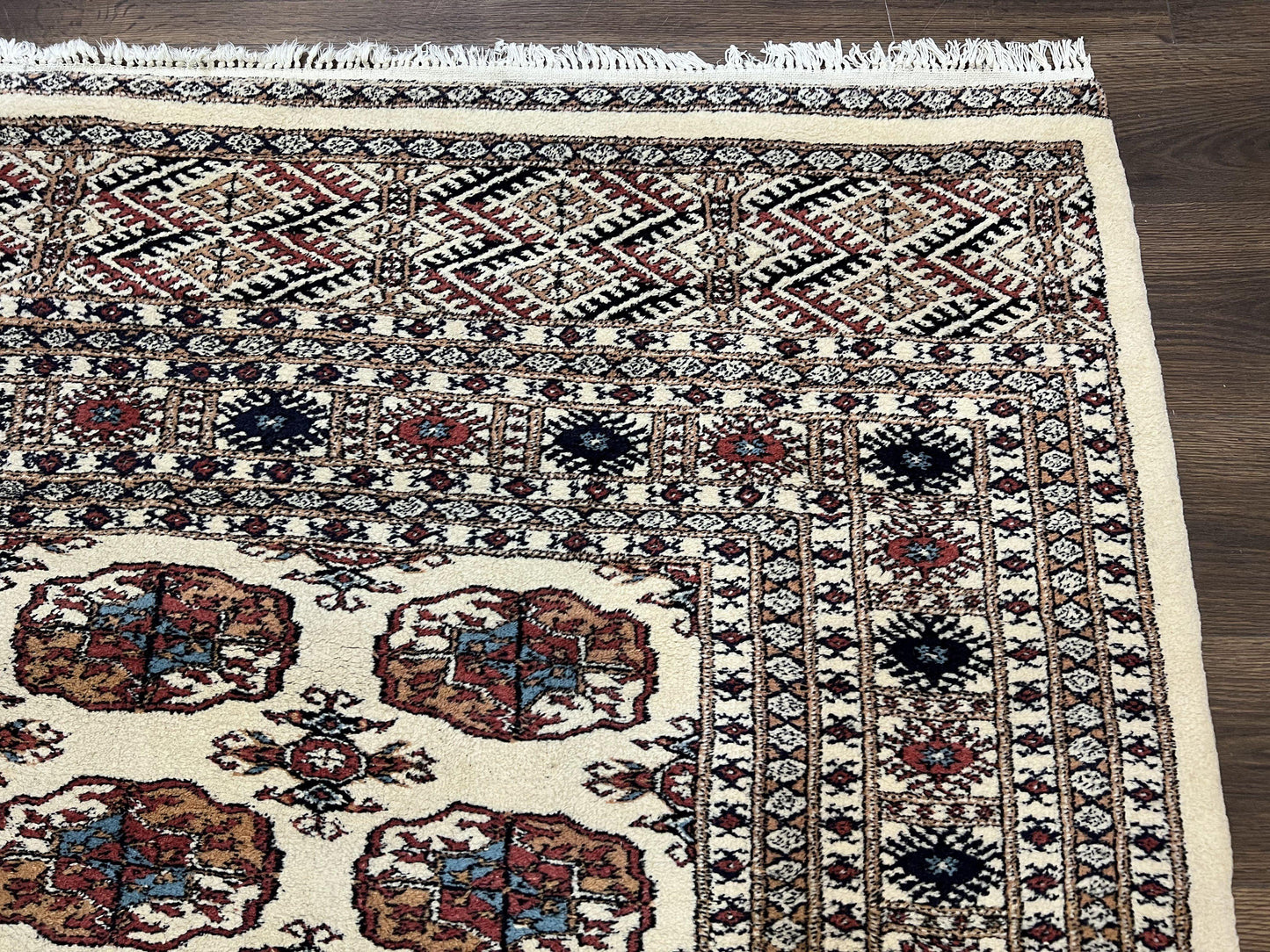 Pakistani Bokhara Rug 8x10, Traditional Turkoman Tribal Carpet, Allover Repeated Elephant Foot Motif, Ivory/Cream Black Red, Vintage Handmade - Nuvé