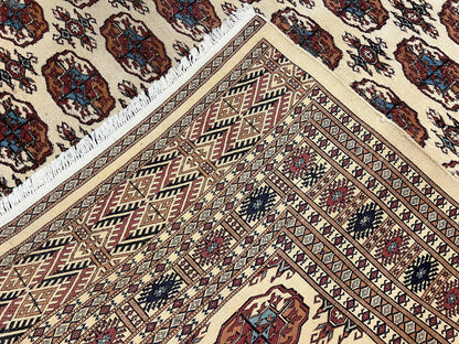 Pakistani Bokhara Rug 8x10, Traditional Turkoman Tribal Carpet, Allover Repeated Elephant Foot Motif, Ivory/Cream Black Red, Vintage Handmade - Nuvé