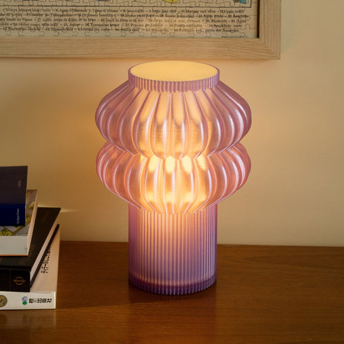 Terrra Labs Oppi table lamp with a sleek modern design and warm white light, perfect for bedside or desk lighting.