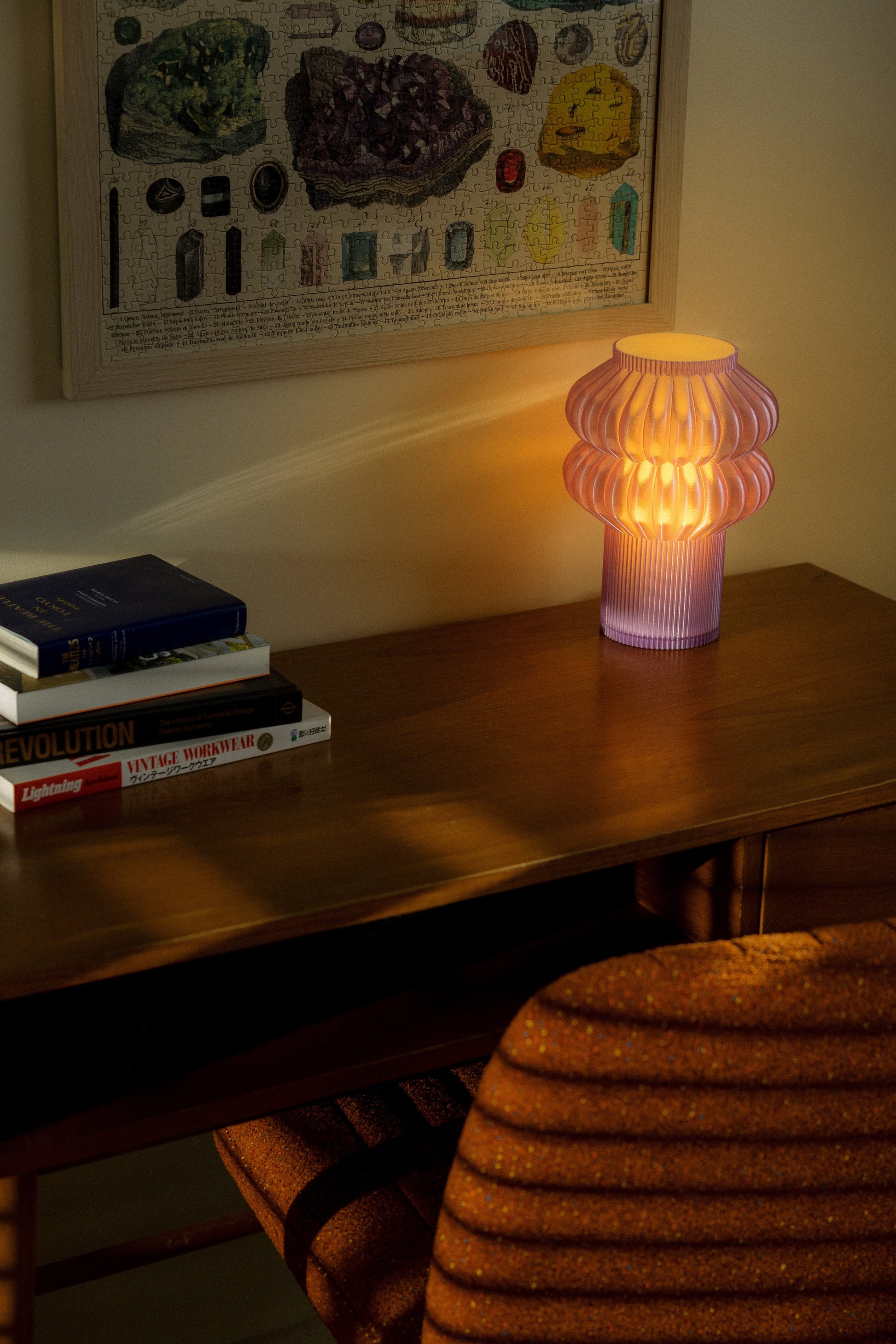Terra Labs Oppi table lamp with a sleek, modern design, featuring a cylindrical shade and a minimalist base.