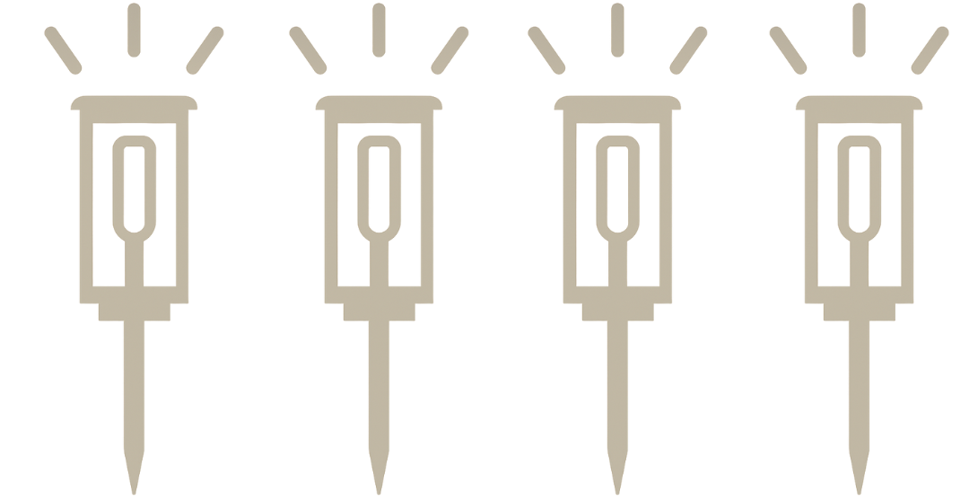 Four light bulb icons with pins on a white background