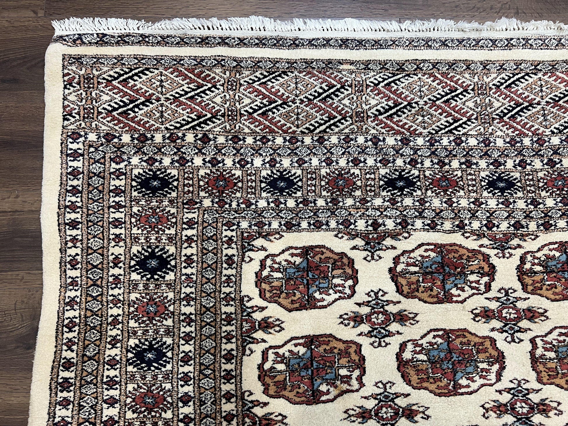 Pakistani Bokhara Rug 8x10, Traditional Turkoman Tribal Carpet, Allover Repeated Elephant Foot Motif, Ivory/Cream Black Red, Vintage Handmade - Nuvé
