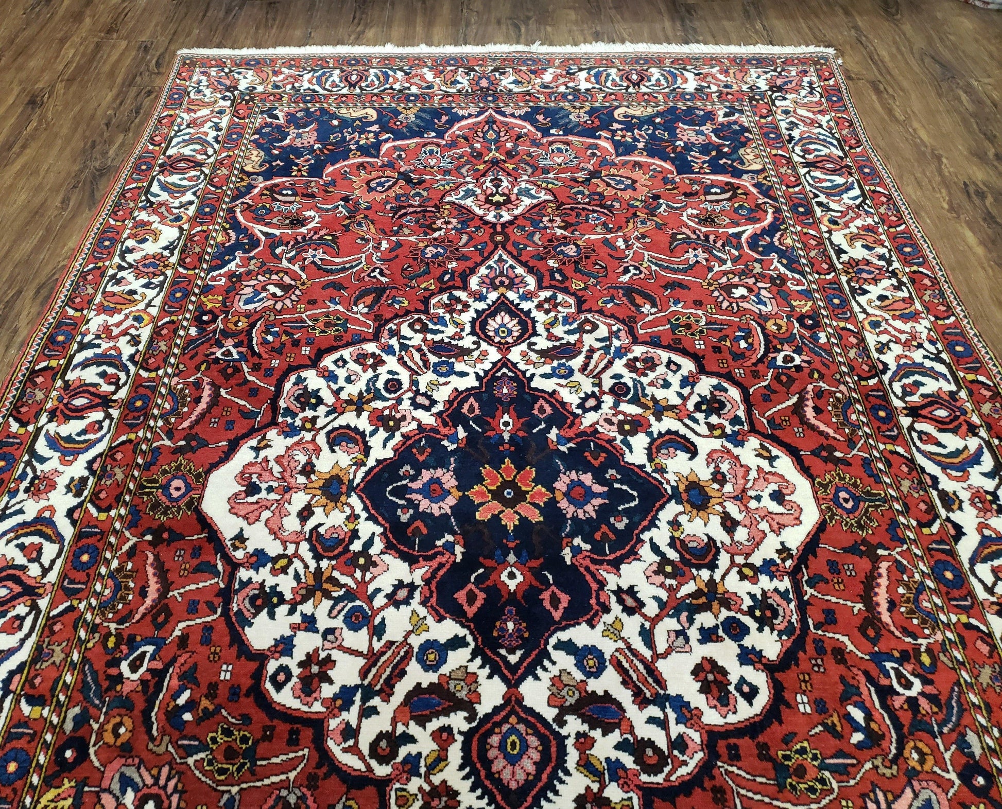 Semi Antique Persian Bakhtiari Rug, Hand-Knotted, Wool, Red, Midnight Blue, Ivory, Floral Medallion, 5'1" x 8' 6" - Nuvé