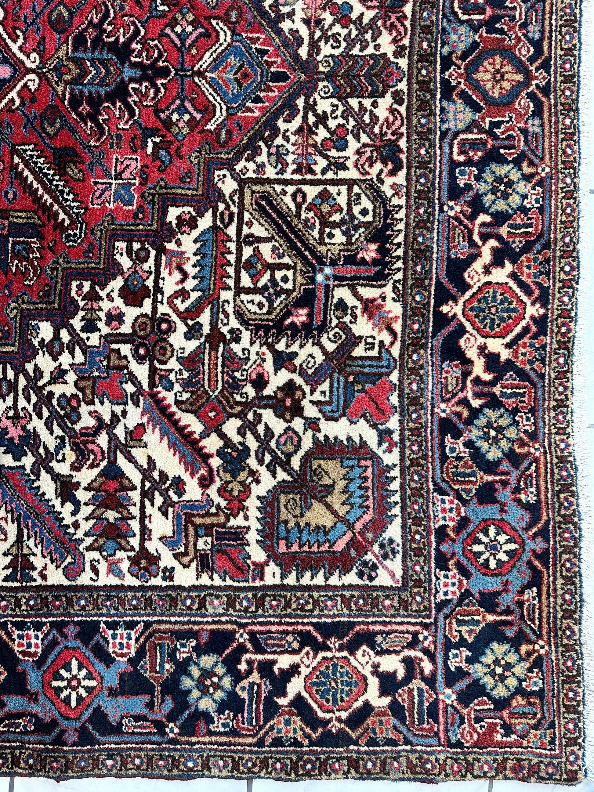 Hand-Knotted Persian Heriz Wool Rug – 9’ x 12’ – Geometric Medallion Design - Nuvé