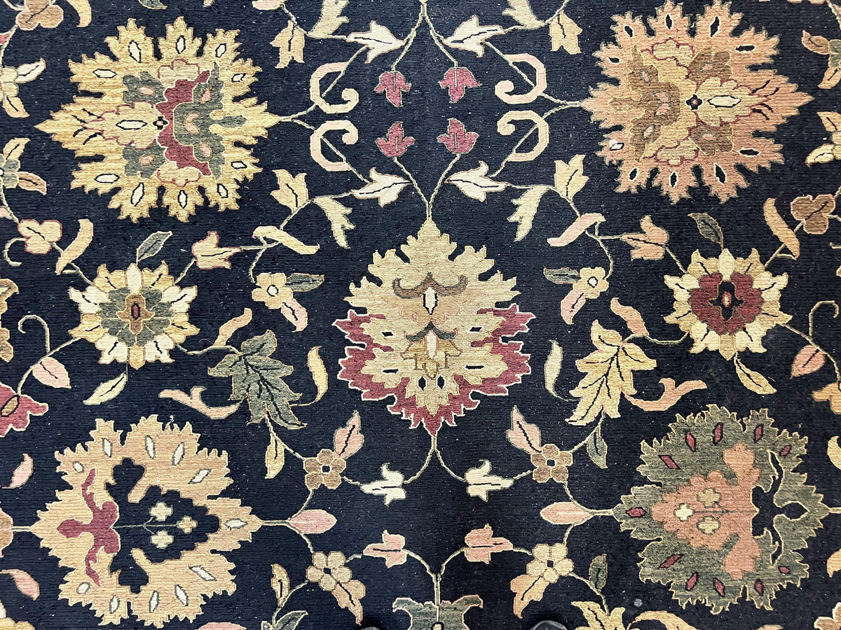 Handmade Indo Persian wool rug featuring floral oriental design in black and beige, 10x14 size, by Jewel Rugs.