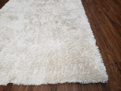 Safavieh Shag Rug 5x8, Pearl White Color, Isaac Mizrachi Shag Collection 5x7 Carpet, High Pile Soft Fluffly Bedroom Rug, Living Room Rug - Nuvé