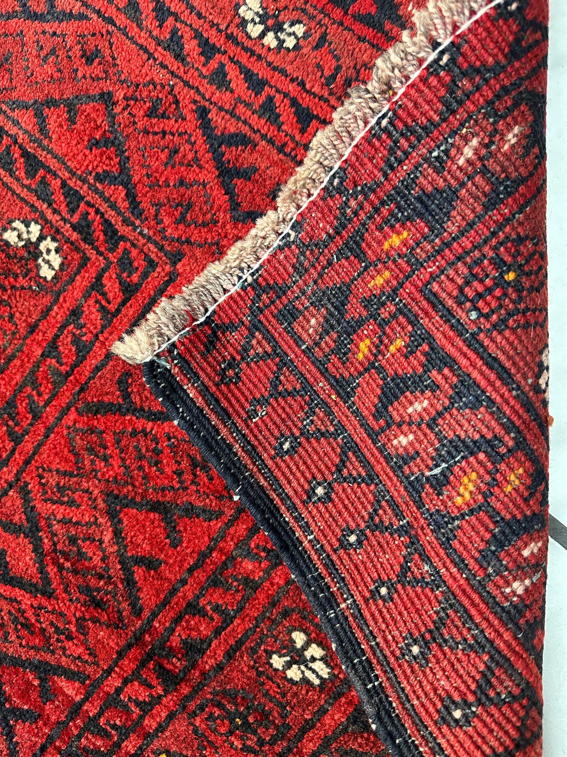 Hand-Knotted Afghan Turkoman Waziri Wool Rug – 6'9" x 9'6" – Vintage Red Elegance - Nuvé
