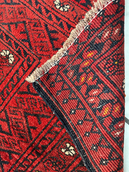 Hand-Knotted Afghan Turkoman Waziri Wool Rug – 6'9" x 9'6" – Vintage Red Elegance - Nuvé