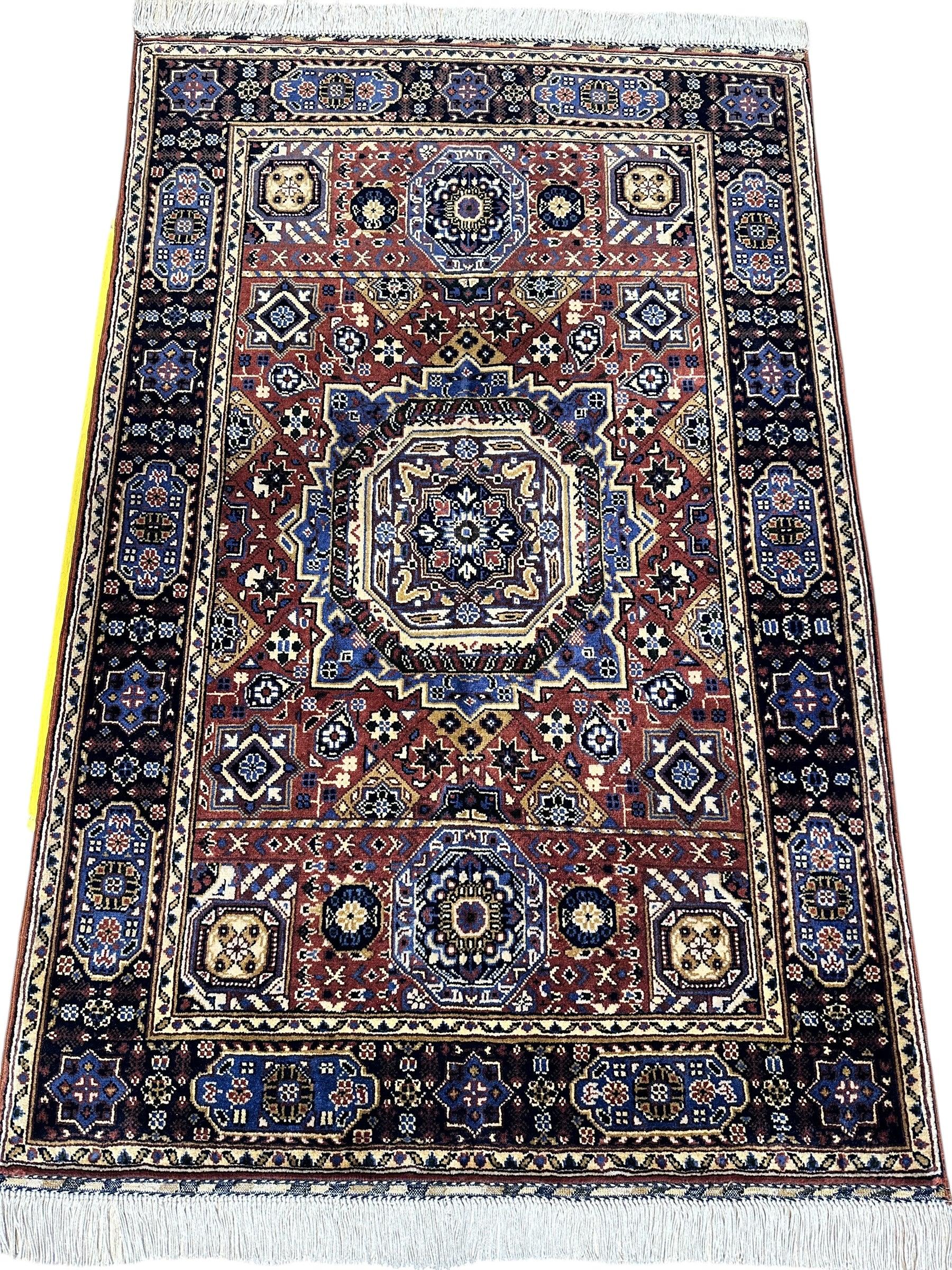 Hand-knotted Afghani Wool Rug by Rugistan featuring blue and brown Mamluk patterns, measuring 40x62 inches.