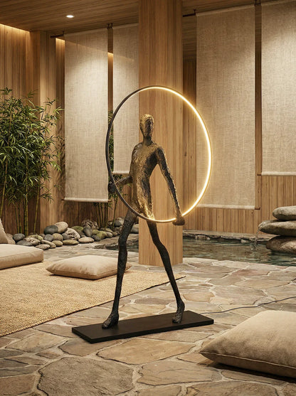 Korewolamp Aeon sculpture characters floor lamp with a modern, artistic design illuminating a room with a unique sculptural style.