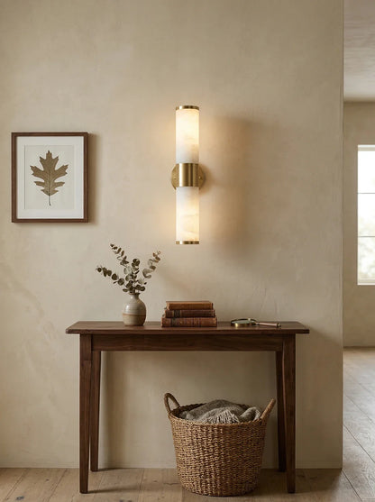 Alabaster Lampatron cylindrical wall lamp by korewolamp, showcasing a sleek alabaster finish and modern wall lighting design.