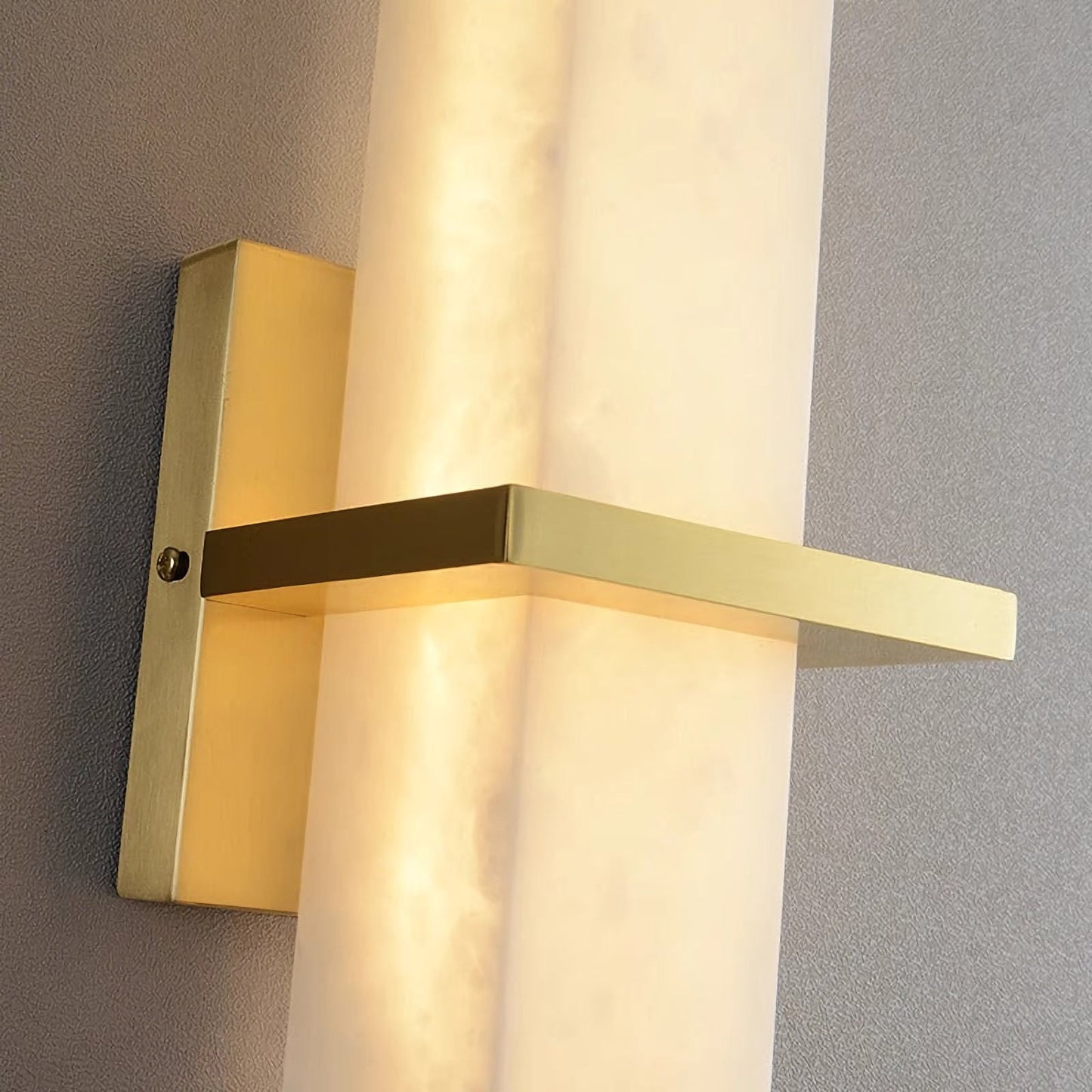 Alabaster Milan wall lamp by Korewolamp featuring a smooth alabaster shade mounted on a sleek wall fixture.