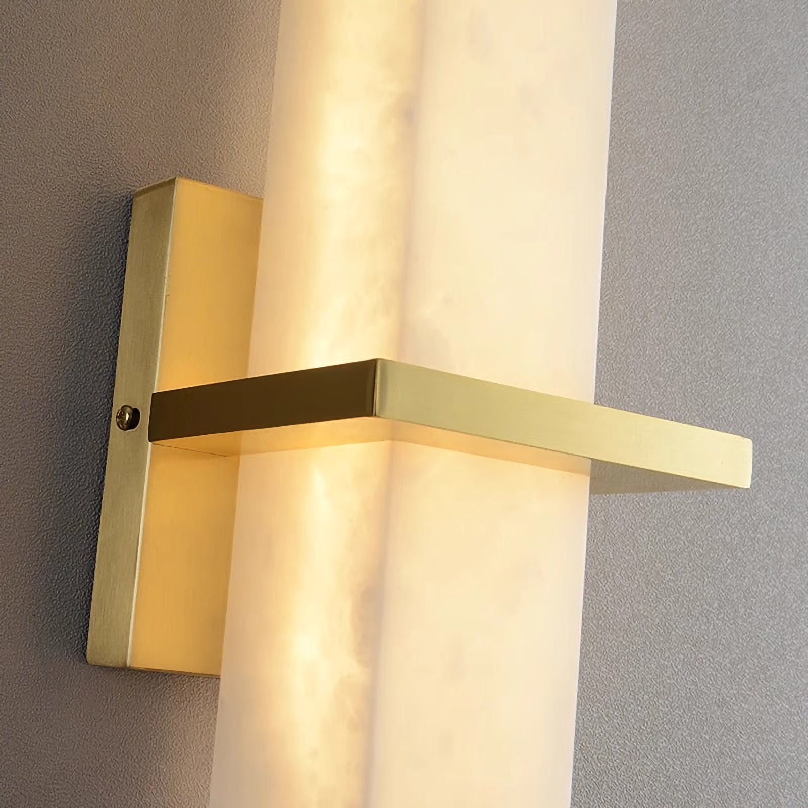 Alabaster Milan wall lamp by Korewolamp featuring a smooth alabaster shade mounted on a sleek wall fixture.
