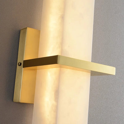Alabaster Milan wall lamp by Korewolamp featuring a smooth alabaster shade mounted on a sleek wall fixture.