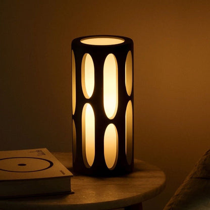 Amoeba Terra Labs table lamp with organic, amoeba-shaped glass shade and sleek metal base on a modern surface.