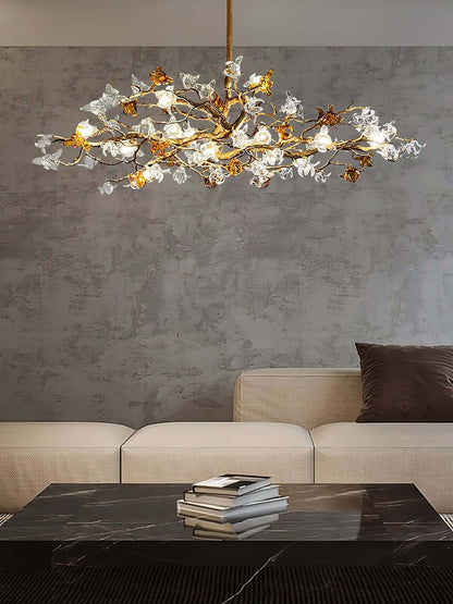 Aosta brass glass branch chandelier by Korewolamp featuring elegant glass flower accents and intricate brass detailing.