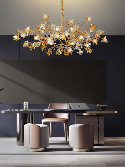 Aosta brass glass flower chandelier by korewolamp featuring brass branches and delicate glass flower details.