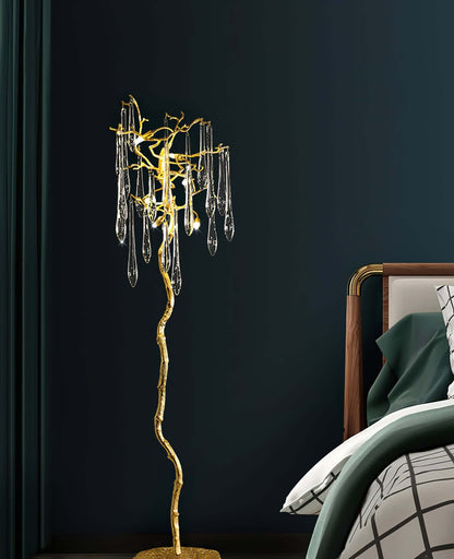 Korewolamp Aqua Babylonica floor lamp with a vibrant blue glass base and a tall, sleek metallic stand, modern lighting design