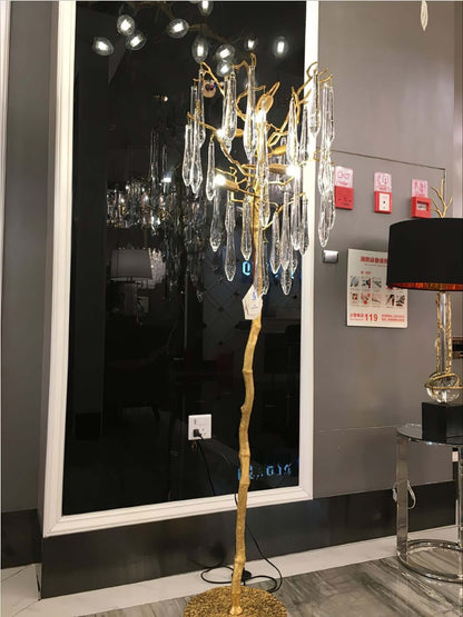 Korewolamp Aqua Babylonica floor lamp with a tall, elegant glass design and sleek metal base, ideal for modern interior lighting.