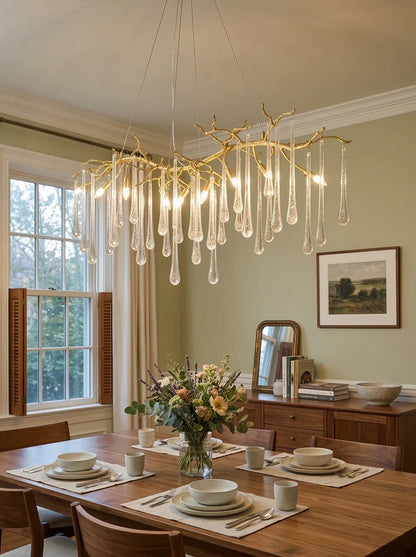 Aqua Makrama chandelier by korewolamp featuring intricate blue and white woven designs hanging from a metal frame.