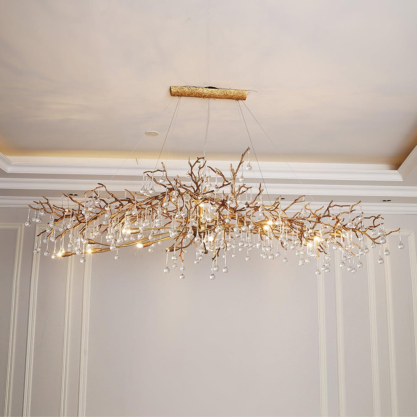 Korewolamp Bijou Crystal Drop Chandelier featuring a tree branch design with sparkling crystal drops and elegant metal details.