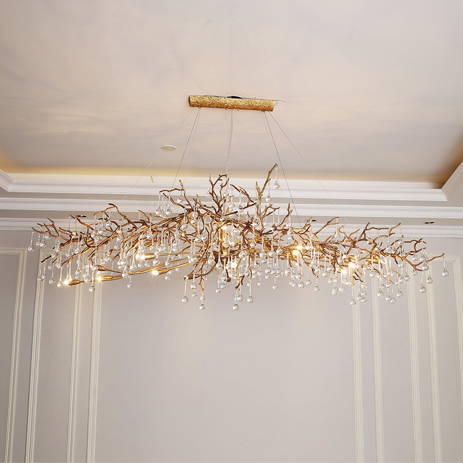 Korewolamp Bijou Crystal Drop Chandelier featuring a tree branch design with sparkling crystal drops and elegant metal details.