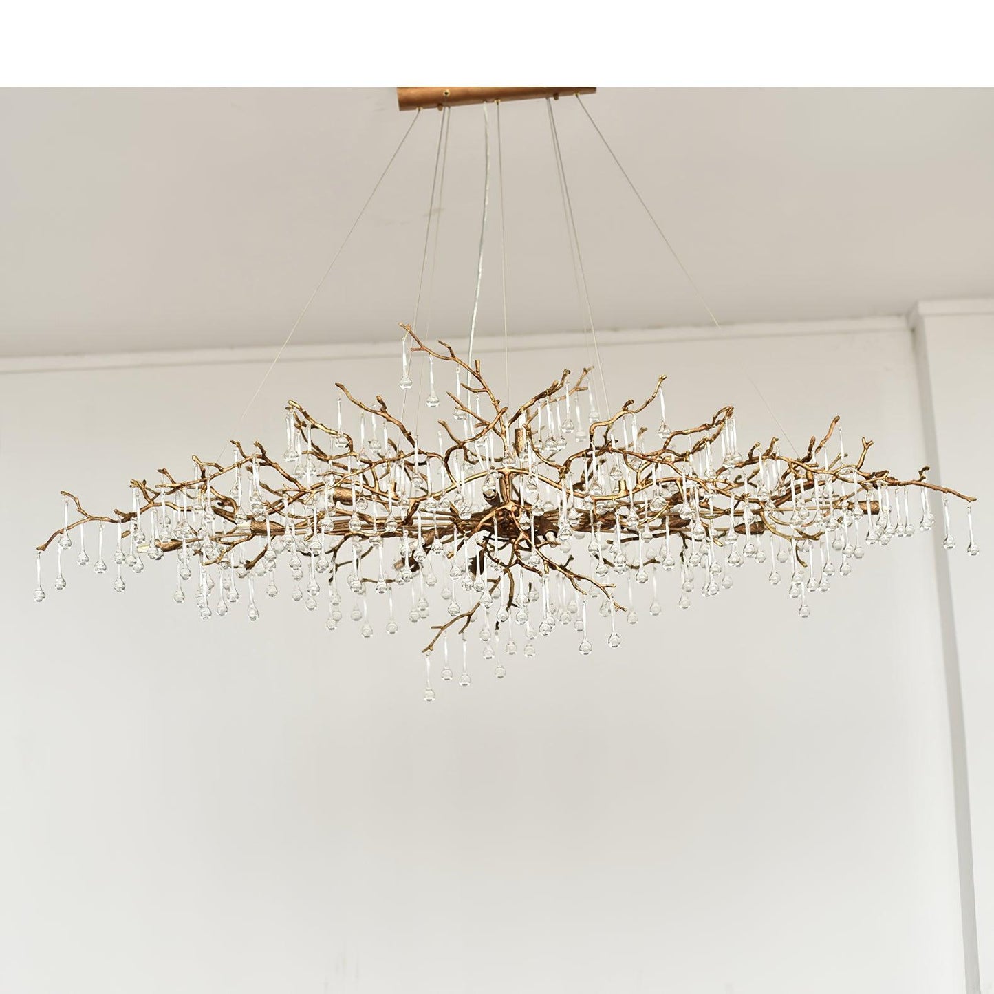 Korewolamp Tree Branch Bijou Crystal Drop Chandelier with hanging crystal droplets and intricate branch design.
