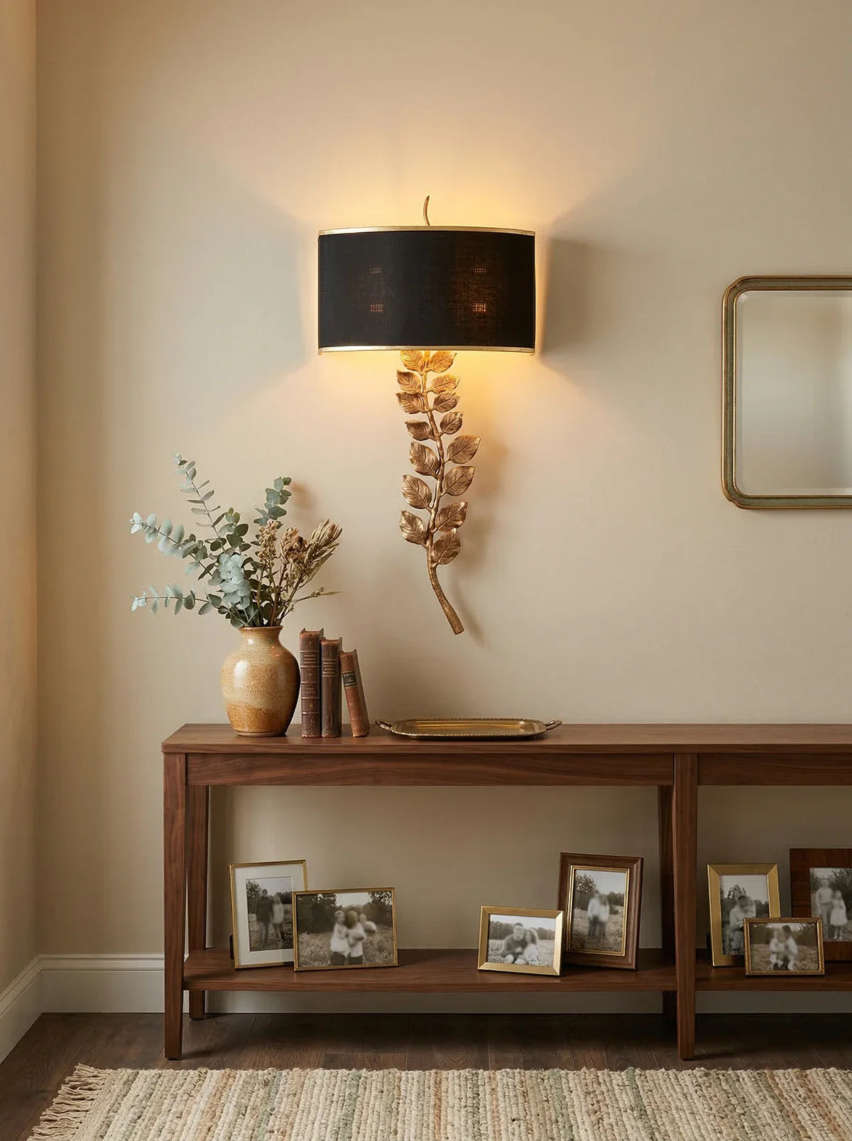 Korewolamp Birdwood wall lamp with sleek metal finish and adjustable arm, mounted on a wall for modern lighting.