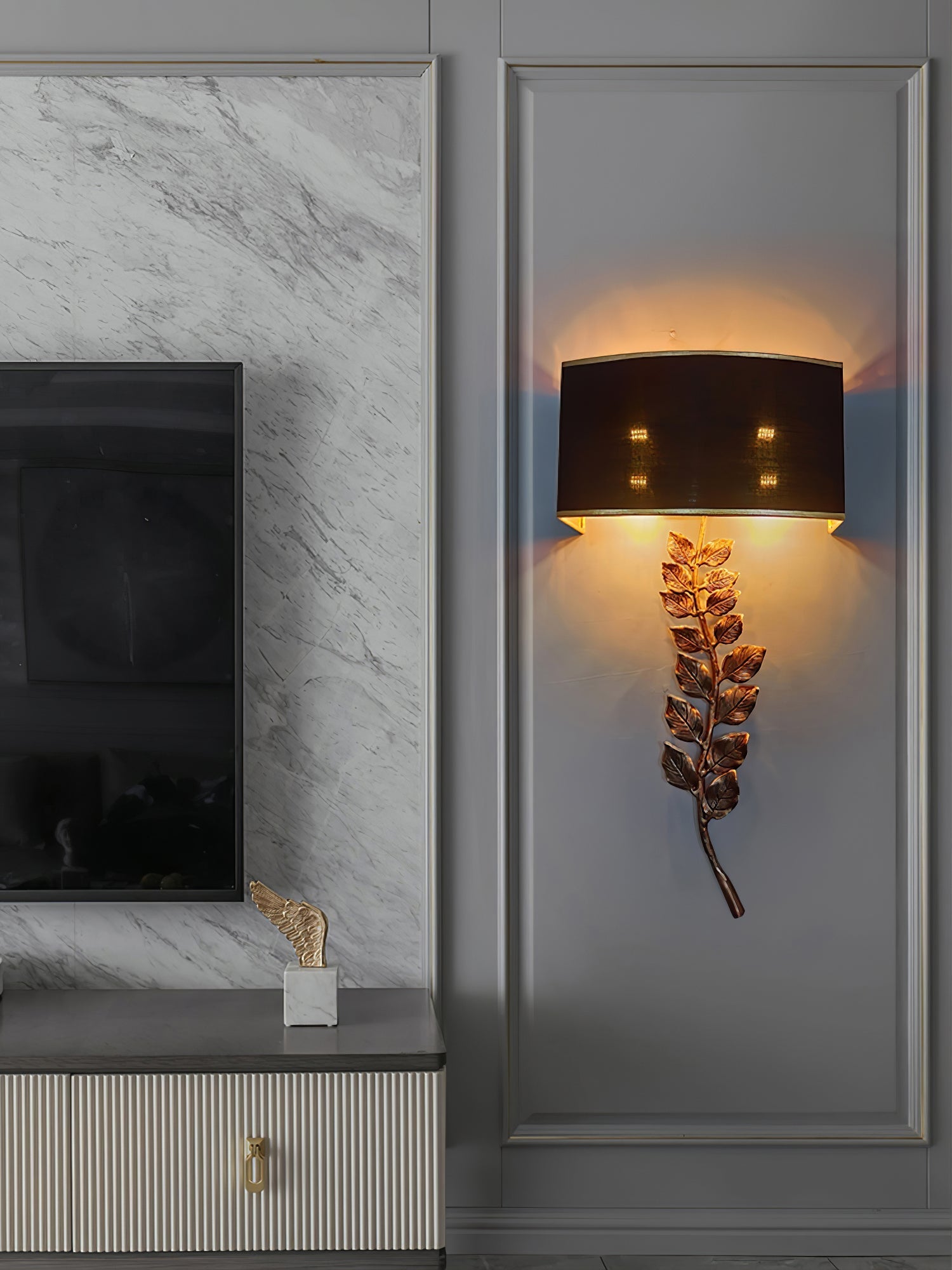 Birdwood Wall Lamp by korewolamp wall sconce with modern design and sleek metal finish, mounted on a white wall.