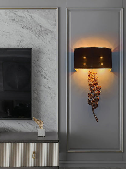 Birdwood Wall Lamp by korewolamp wall sconce with modern design and sleek metal finish, mounted on a white wall.