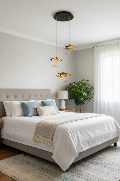 Brass aviary constellation chandelier by korewolamp featuring intricate bird and star-shaped designs in a polished brass finish.
