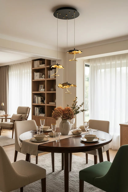 Brass aviary constellation chandelier by korewolamp, featuring intricate bird and star-shaped design for elegant lighting.