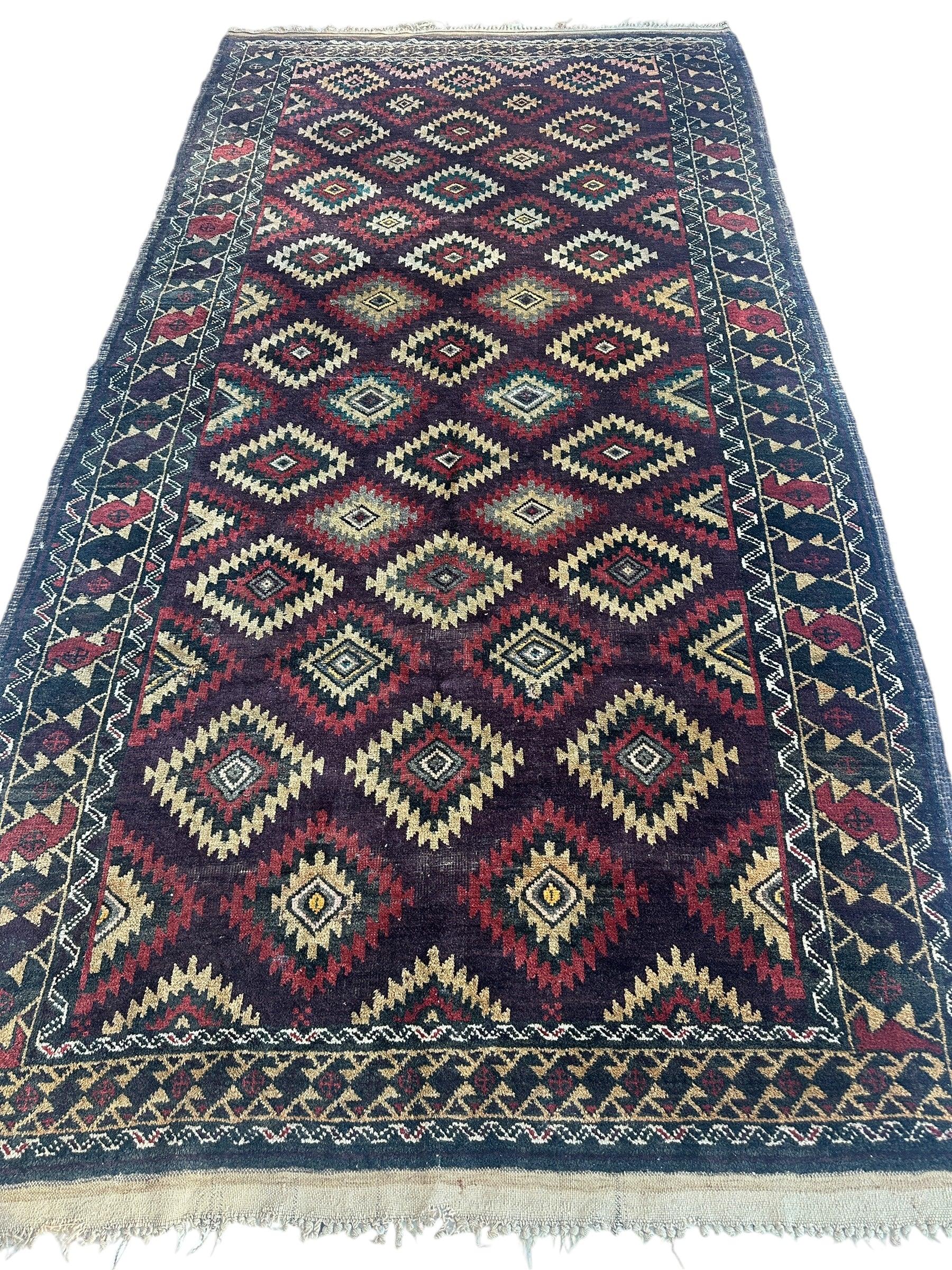 Antique 1900’s Tribal Baluch Wool Rug 4’5” x 8’6” - Nuvé