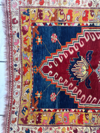 Hand-Knotted Antique Turkish Melas Wool Rug – 4'3" x 5'11" – Vibrant Geometric Motifs - Nuvé