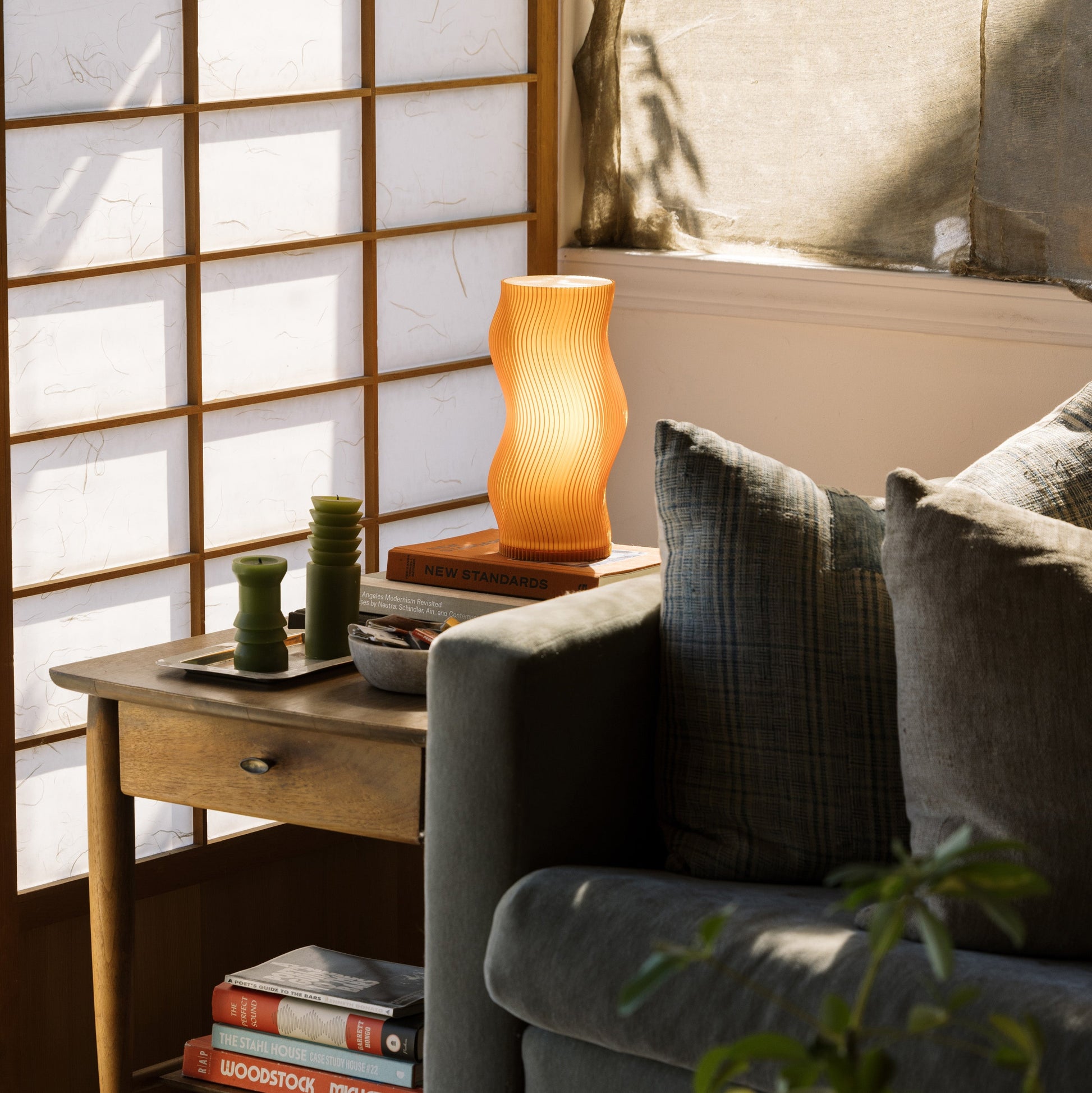 Terra Labs Woogie Table Lamp with colorful, textured ceramic base and soft fabric shade, ideal for modern living spaces.