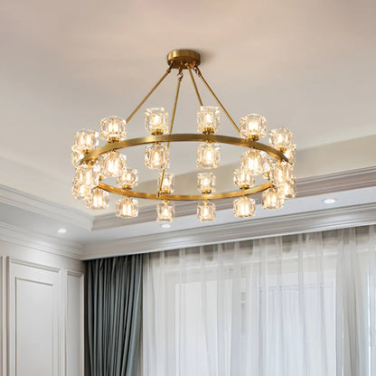 Elegant gold chandelier with crystal cube accents, designed by korewolamp, hanging with multiple crystal cubes for a luxurious look.