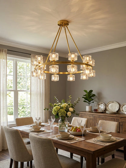 Elegant crystal cube gold chandelier by korewolamp featuring hanging crystal cubes and a polished gold finish.